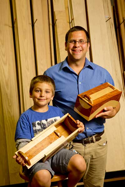 Matthew Heiman with his "Landscape Diptych 1 and 2" entry and son Oliver
