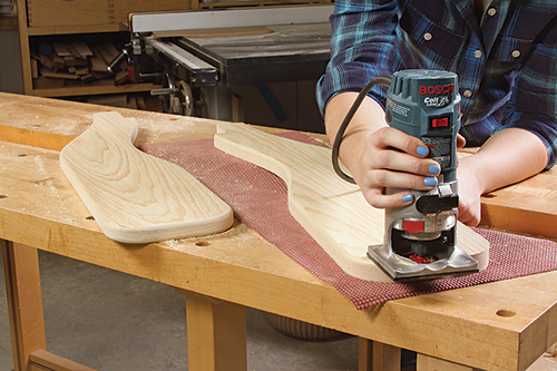 Routing Adirondack chair arms along template