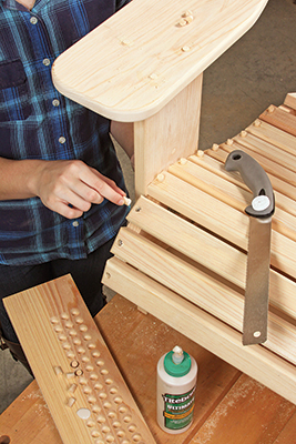 Filling screw holes in Adirondack chair with plugs