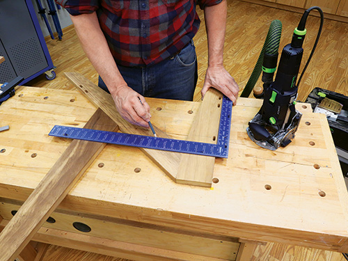 Marking seat installation location on Adirondack chair frame