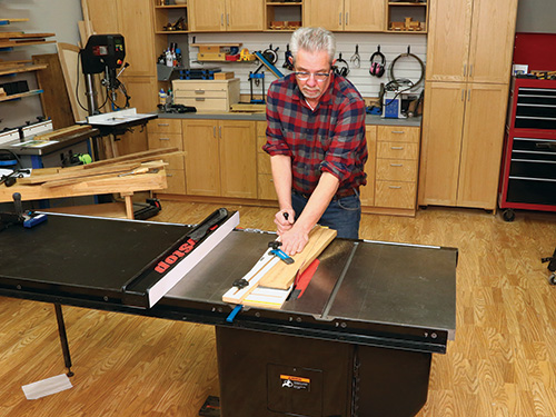 Using jig to cut tapers in Adirondack chair arms