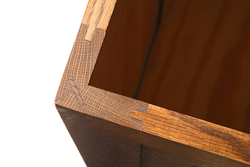 Splined corner of Arts and Crafts blanket chest