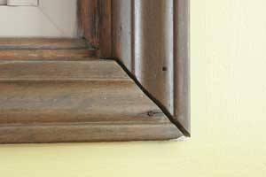 BADTRIM3-300x200 Another gaping miter joint, this time with a poorly placed nail right in the middle of the casing instead of in the shadow line. It's gotta go.