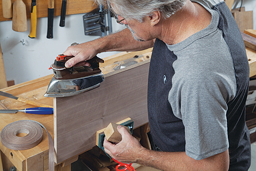 Ironing edge veneer onto vanity panel