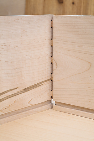 Demonstrating test fit of vanity drawer corner