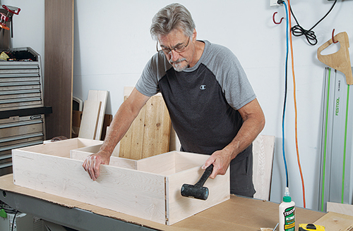 Hitting drawer sides into place