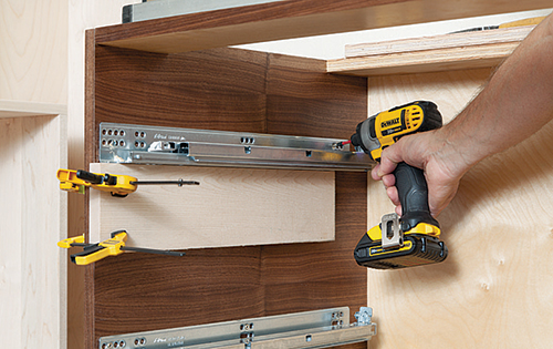 Attaching drawer slide hardware onto vanity casework