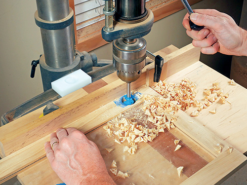 Drilling indentation for installing charging cabinet door hinge