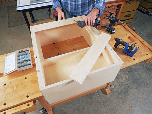 Attaching French cleat to battery charging cabinet