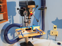 Drill press support with T-tracks