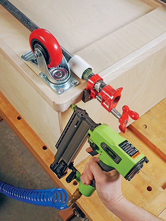 Attaching solid wood skirt boards to tool cart with a nail gun