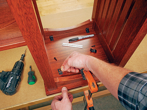 Installing plant stand shelving fasteners