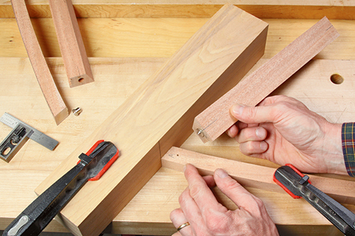 Transferring dowel hole location to tray table legs