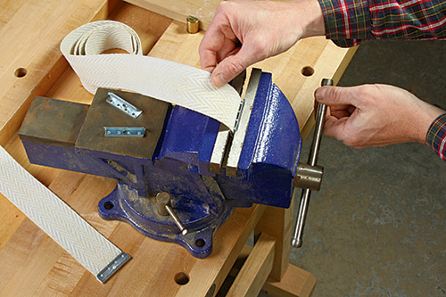 Cutting webbing for tray support on legs