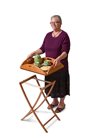 Tray table with folding legs in use