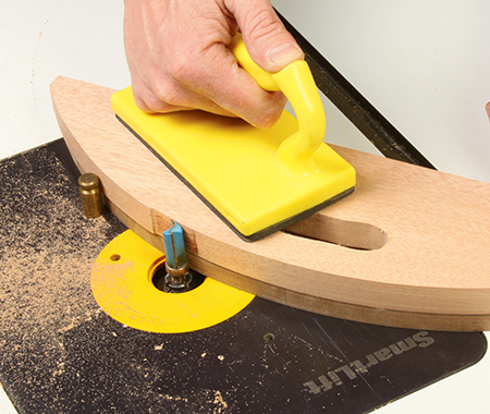 Using template to help get correct shape for folding arms