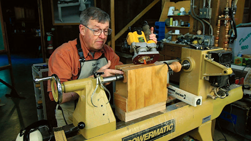 Ernie Conover setting up a dovetail cutting jig on lathe