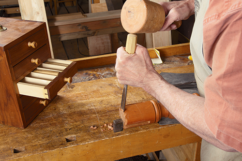 Cutting V shapes in candlestand table stem