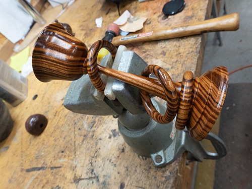 Cutting turned ring to create interlocked look