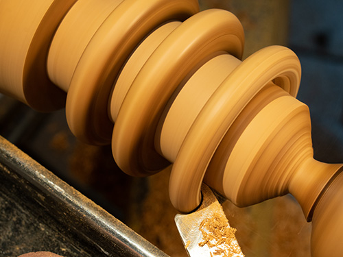 Using captured-ring tool to split ring shapes from turning blank