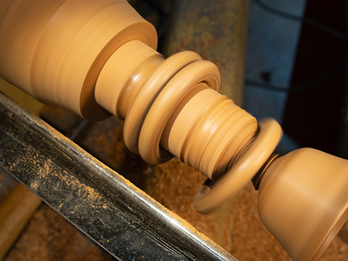 Captured ring turnings on goblet turning base