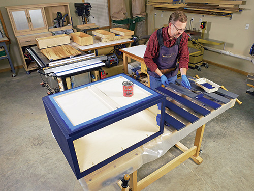 Applying milk paint over gray primer with a roller