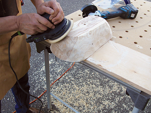 Rotating bowl blank to carve the ends