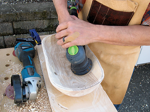 Power sanding the interior of dough bowl