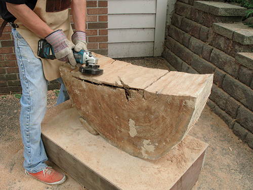 Removing chainsaw marks with Arbortech planing tool