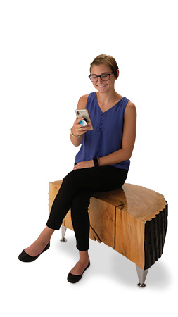 Finished cottonwood table being used as a seat