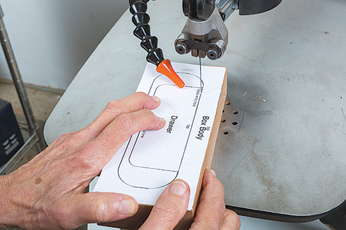 Cutting drawer front with template and scroll saw