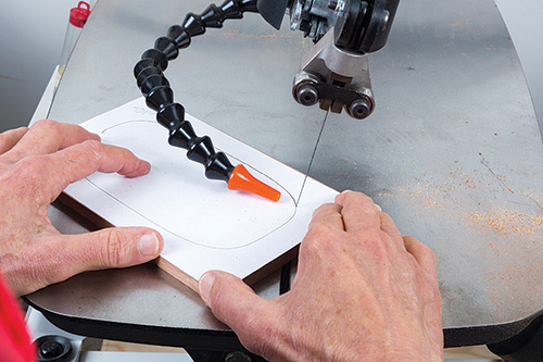 Template and scroll saw to guide box lid cut