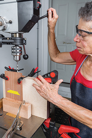 Clamping caddy box base in drill press
