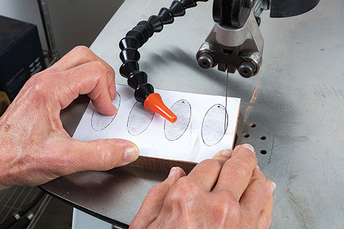 Cutting decorative inlays with scroll saw