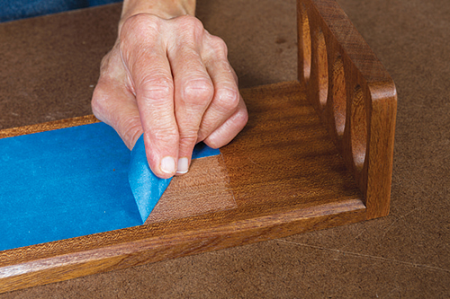 Finishing around taped area for caddy box base