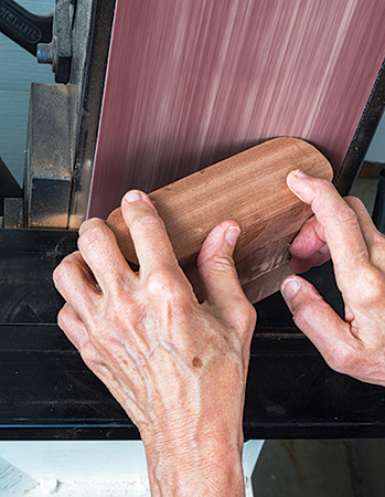 Using belt sander to smooth curved drawer