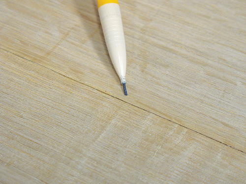 Close-up view of visible seams between veneer pieces