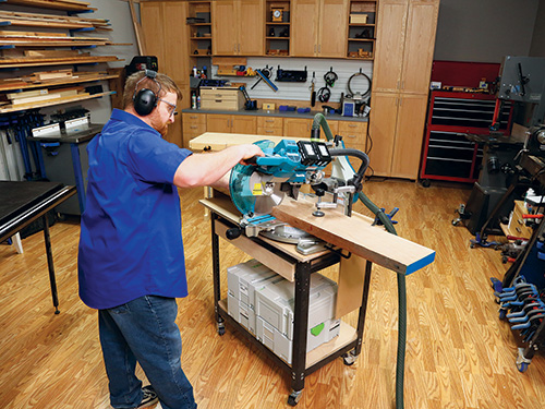 Cutting down pieces of cherry lumber