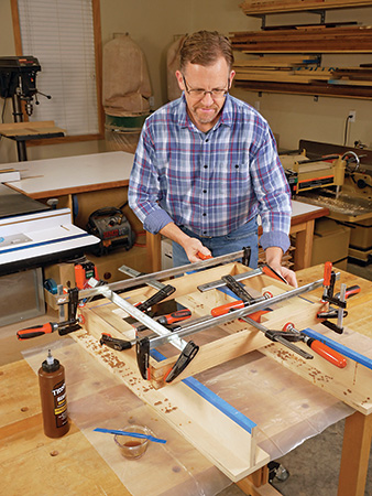 Clamping up wine cabinet apron assembly