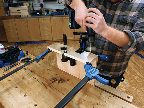 Attaching side for under-table shelf