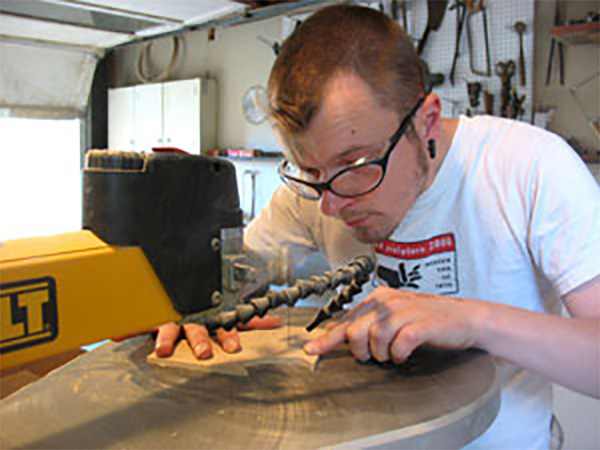 Scroll cutting puzzle pieces