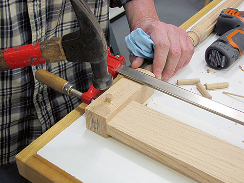 Installing pinning tenon with hammer