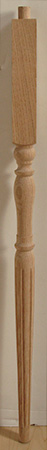 Stairway baluster repurposed for use as a table leg