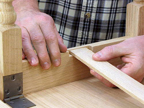 Test fitting locking apron against apron joinery