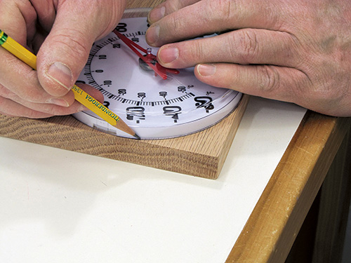 Using round thermometer to trace round edge cut