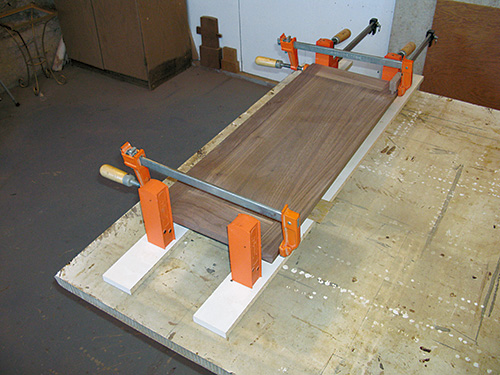 Clamping up frame and panel for walnut bookcase