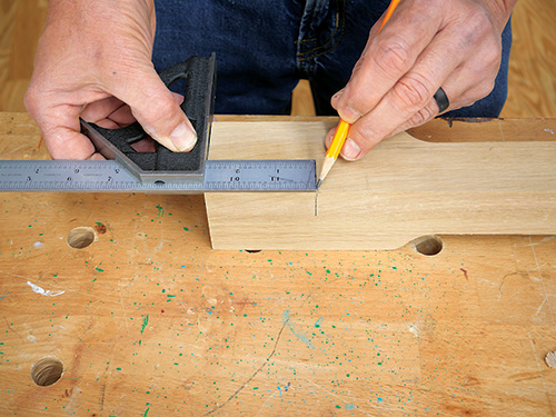 Using straight-edge to check joinery location