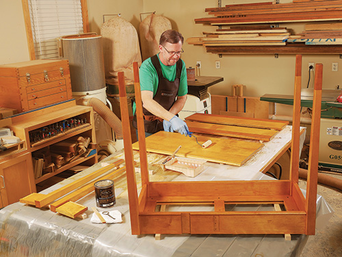 Applying dye stain finish to drop-leaf table top