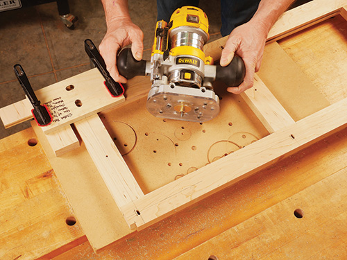 Routing slots in drop-leaf table web frame