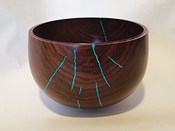Turned bowl with aqua crack fillers